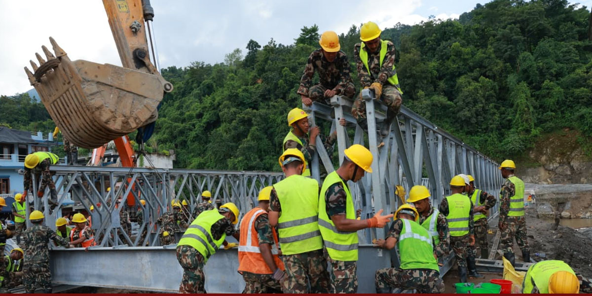 पूर्वाधार पुनर्निर्माणमा सेना,तादी नदीमा ६० मिटरको एक्रो ब्रिज निर्माण,अवरुद्ध सडक खुलाइँदै